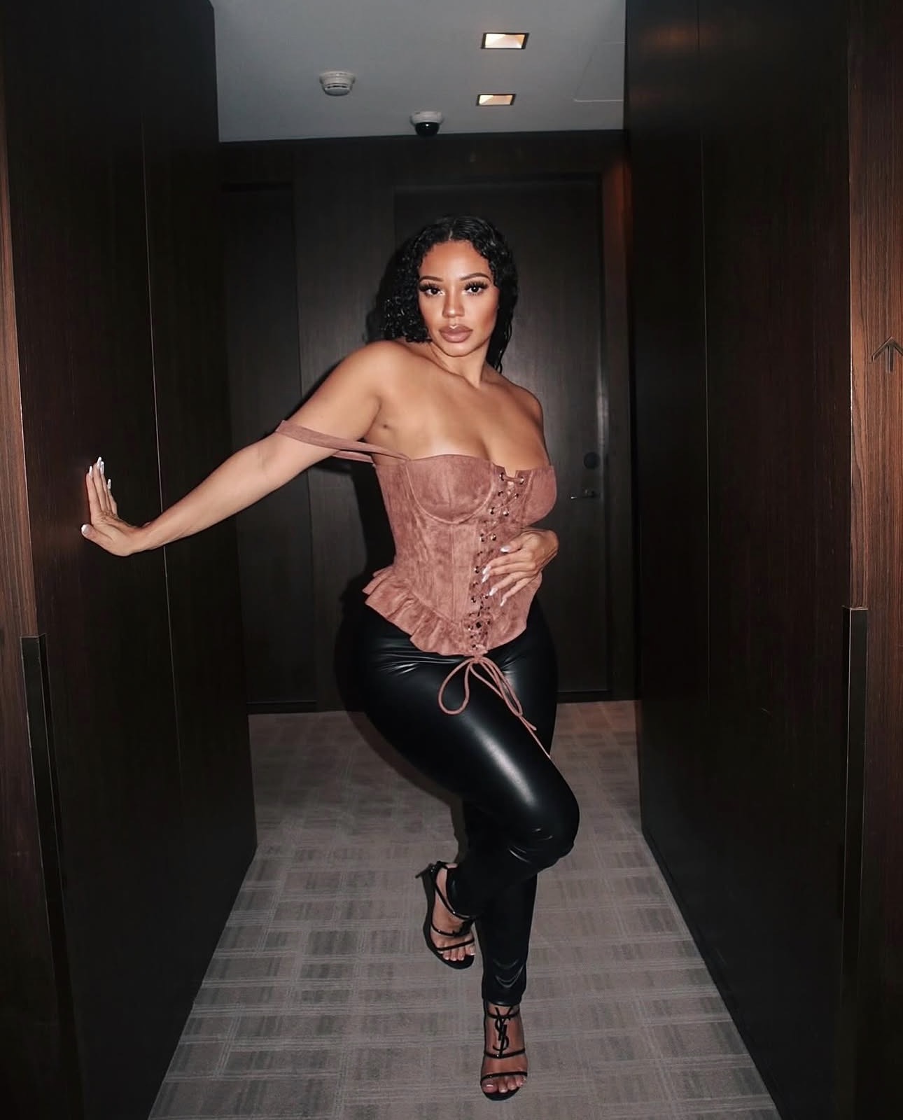 Natalie in an editorial black dress